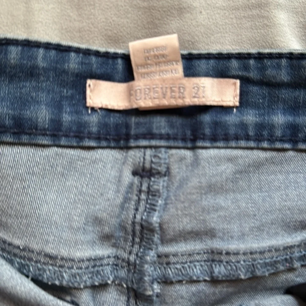 2 forever 21 jeans and 1 almost famous jeans brand ( total of 3 jeans )